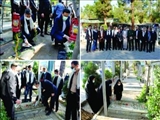 آیین غبارروبی مزار شهدا با حضور مدیران شهرداری کهریزک