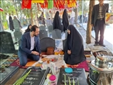 مزار مطهر شهدای فاطمیون در بهشت زهرا عطرافشانی و گلباران شد