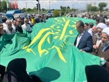 گزارش تصویری/اهتزاز پرچم مزین به نام مبارک امام رضا(ع) در قرچک