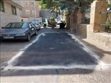 اجرای عملیات لکه گیری و آسفالت خیابان معلم در شهر رودهن