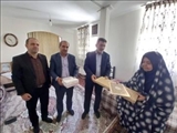 دیدار رئیس اداره روابط عمومی و اطلاع رسانی کمیته امداد استان تهران با خانواده شهید «فردین نیازآبادی»