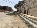 عملیات مرمت و بهسازی جداول خیابان شهادت شهرك فرزان شهرقدس