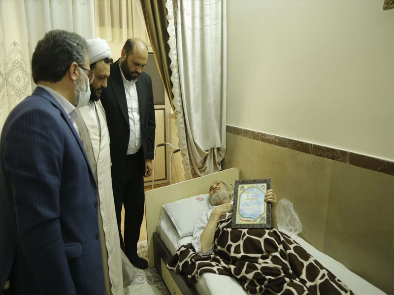 دیدار دکتر قضاتلو با جانباز باقرشهری