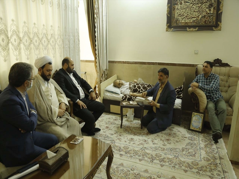 دیدار دکتر قضاتلو با جانباز باقرشهری