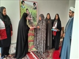 هلال احمری ها میهمان مادر شهید مدافع حرم هادی غلامی