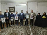 تجلیل فرماندار قدس و رئیس فدراسیون وزنه‌برداری از خانواده شهیدان پیرویسی / ادای احترام به ورزشکاران شهید عرصه جهاد و قدرت
