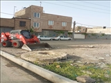 نخاله‌برداری و تسطیح زمین‌های خالی در محله محمدآباد شهرقدس