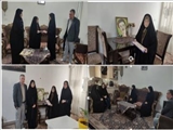 دیدار رئیس اداره کتابخانه‌های عمومی شهرستان قرچک با خانواده شهید روناسی 