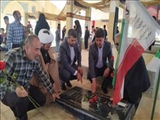 غبار روبی و گلباران مزار شهدا به مناسبت هفته دفاع مقدس در شهر فیروزکوه