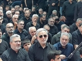 مراسم عزاداری تاسوعای حسینی در مقابل بیت شهید تاسوعا، آقا مصطفی صدرزاده