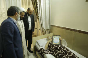 دیدار دکتر قضاتلو با جانباز باقرشهری