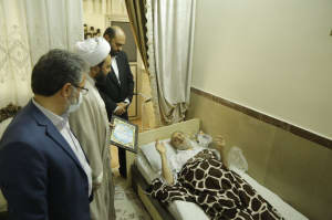 دیدار دکتر قضاتلو با جانباز باقرشهری