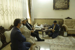 دیدار دکتر قضاتلو با جانباز باقرشهری