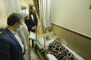 دیدار دکتر قضاتلو با جانباز باقرشهری